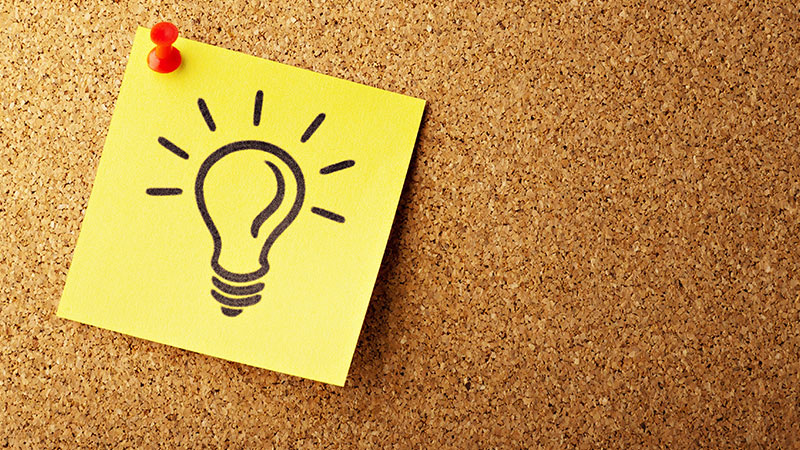 sticky note with lightbulb drawing